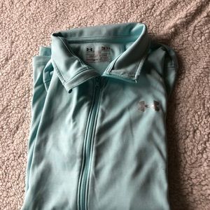 UNDER ARMOR Ladies long sleeved shirt.